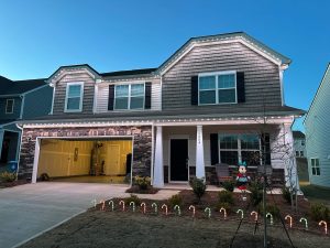 Permanent Christmas lights Houston illuminate a house, enhancing the festive holiday atmosphere with vibrant decorations